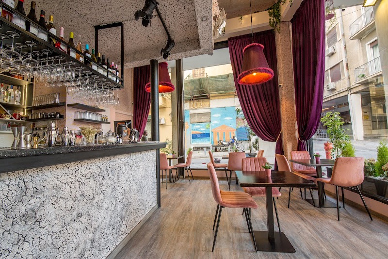 Symposio Restaurant - Photo 1